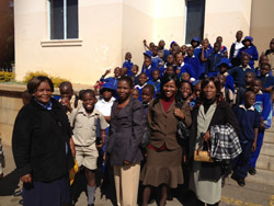 Students and teachers outside the Zimbabwe Academy of Music